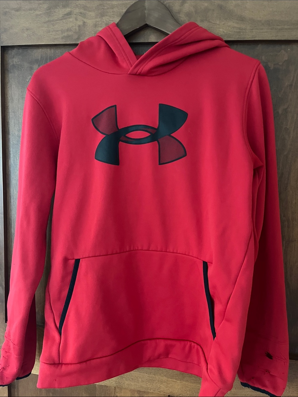 Boy under Armor red hoodie